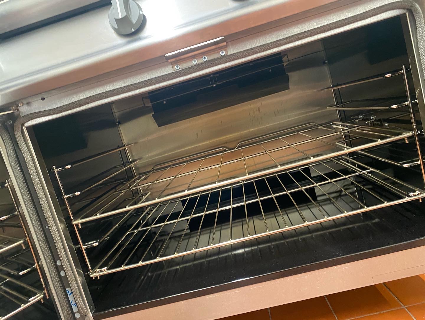 a clean oven showing the results of our effective oven cleaning