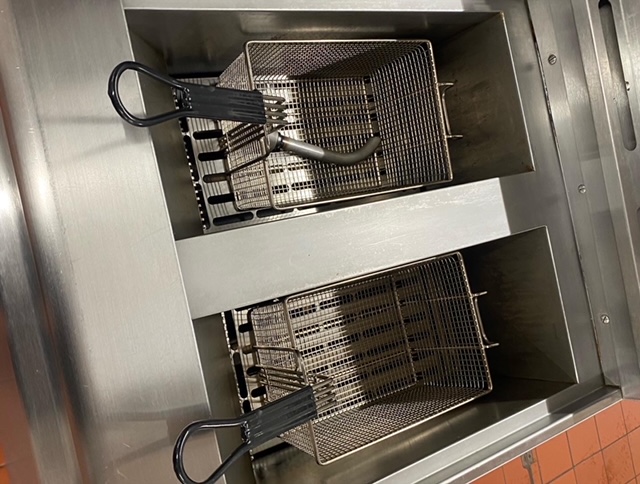 showing a proper oven cleaning completed on a fryer