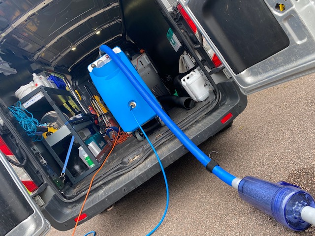 carpet cleaning equipment inside of our AM Cleaning van